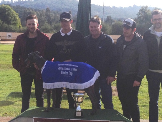 Hard Urned Burst pictured with trainer Darren Pattinson and members of the TRICODE One Syndicate